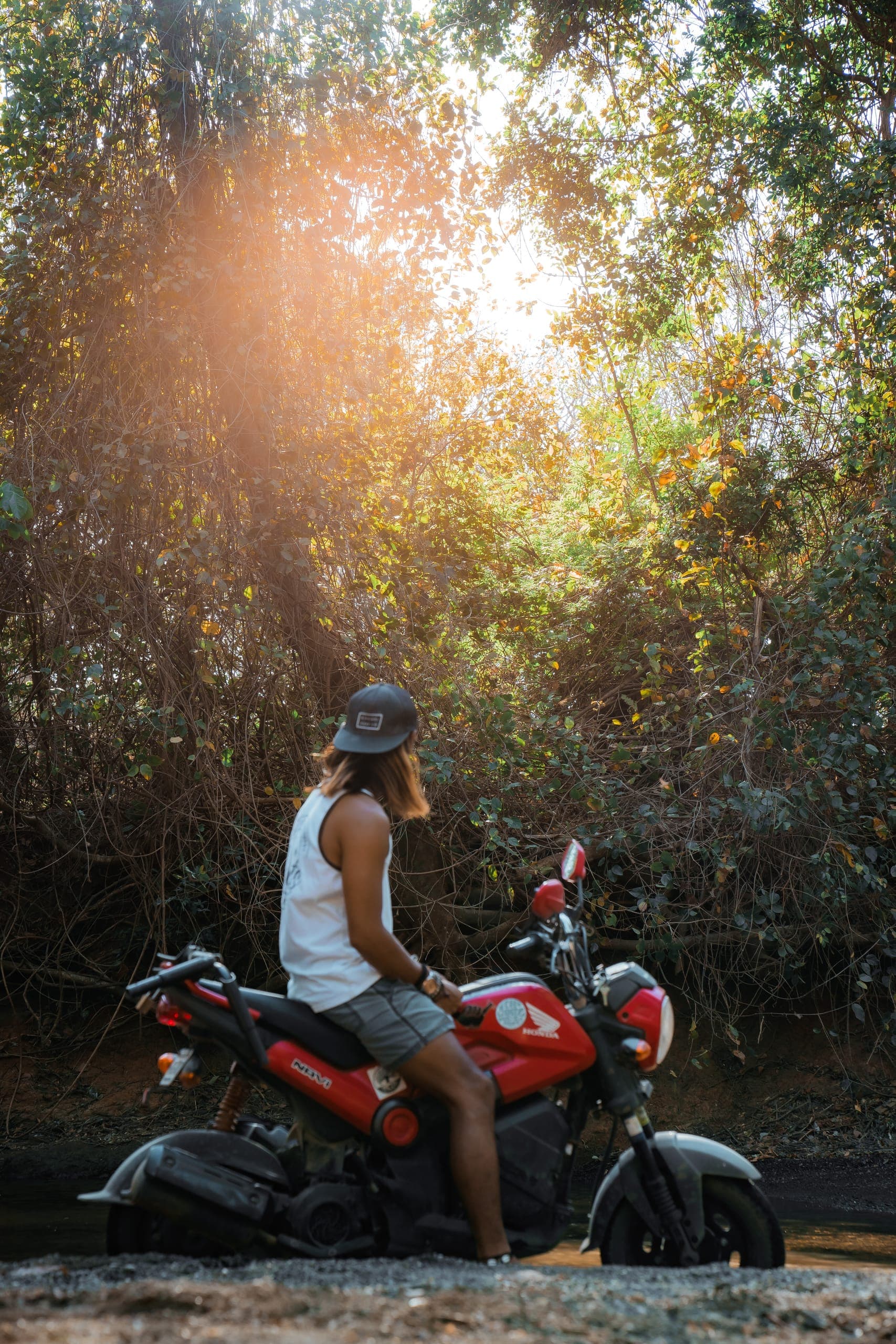 Riding a Honda Navi along the coast